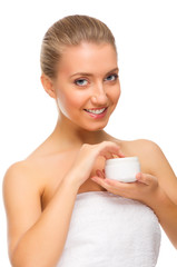 Young healthy woman with body cream