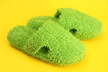 bright slippers, on yellow background