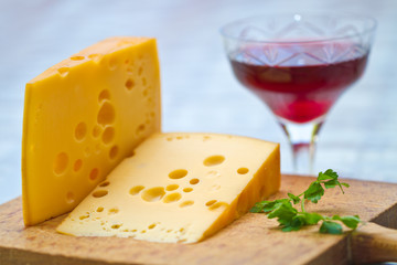 Emental cheese and wine shoot with short DOF
