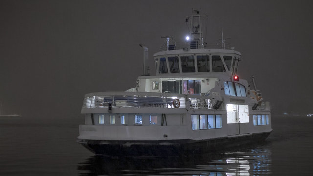 Ferry arriving at night