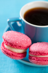 French macaroons and espresso, close-up