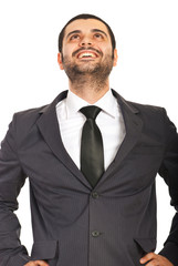 Laughing business man looking up