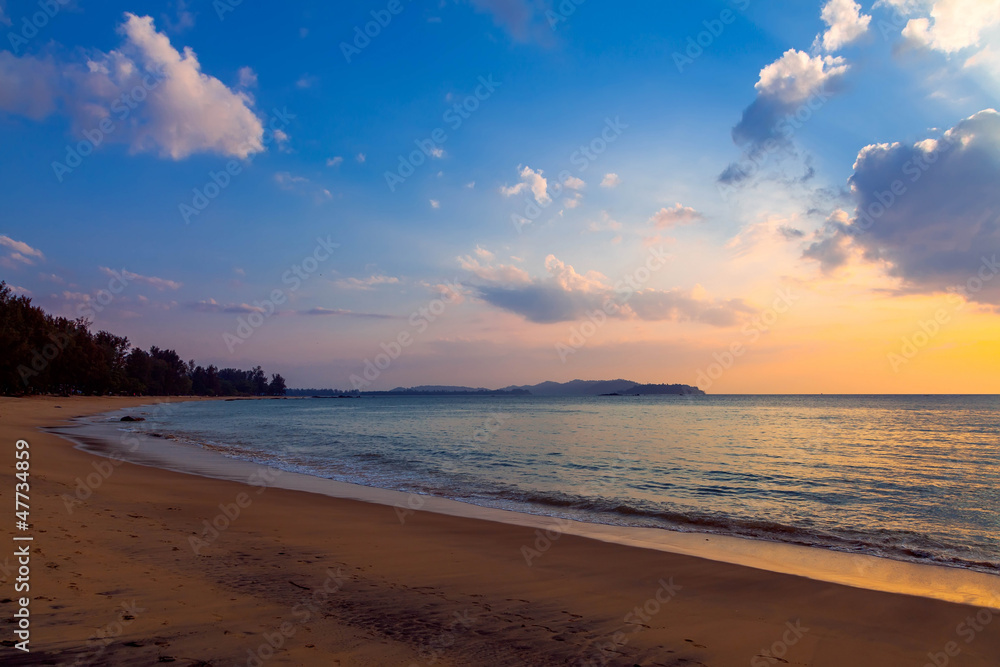 Wall mural sunset on khao lak beach in thailand