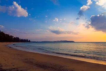 Foto op Plexiglas Zonsondergang aan zee Sunset on Khao Lak beach in Thailand