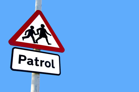 school patrol sign on blue sky background