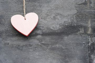 Valentine's Day love heart on rustic style background