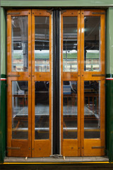 closed sliding door of classic tram in Milan