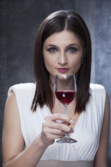 woman celebrating birthday with red wine