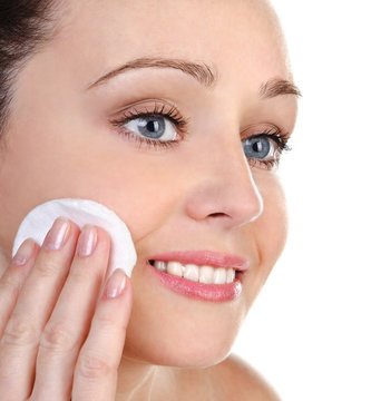 Skincare attractive girl applying face pack