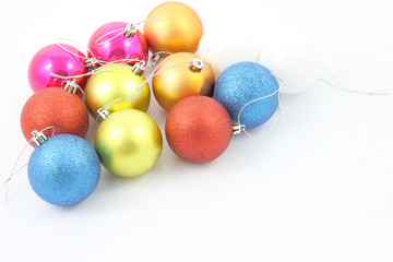 Multiple level group Christmas ball on white background.