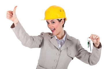 Female architect holding keys