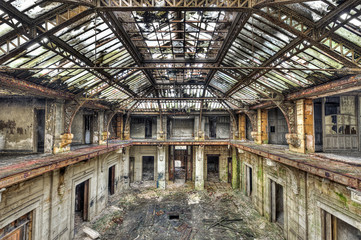 Beautiful glass roof inside the hall of an abandoned central off