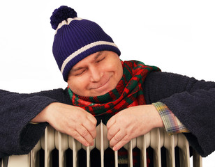 man basking in the heater.