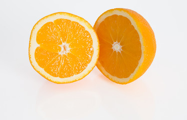 Orange fruit slice on white background