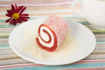 red roll sweet dessert with flower