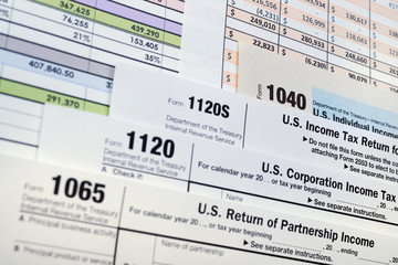 U.S. Income Tax Return forms 1040,1065,1120 - obrazy, fototapety, plakaty