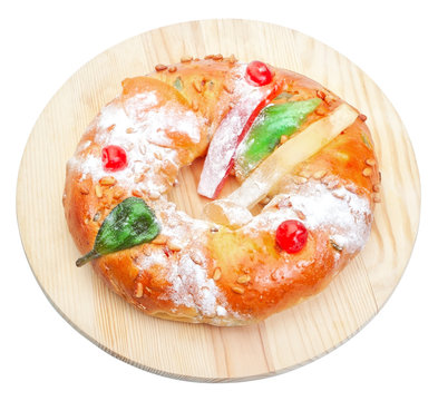Portuguese King Cake On A Wooden Stand. On A White Background. I