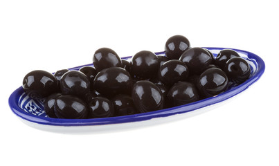 Olives black watered with olive oil in a bowl isolated on a whit