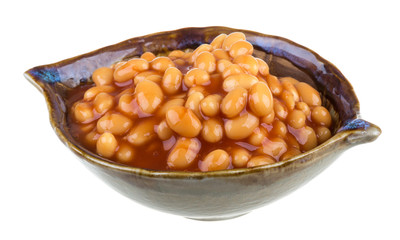 Marinated haricot beans in tomato sauce with shallots on a plate