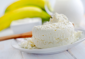 Milk products, fresh cottage in the white plate