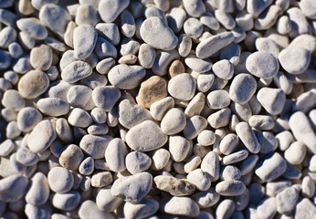 Fototapeta na wymiar whitish stone floor arranged in the sun