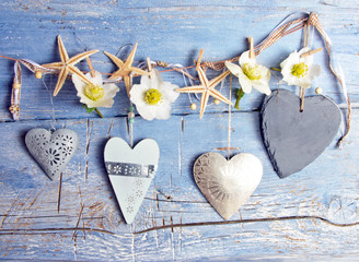 Happy Easter: Hearts and flowers with blue background