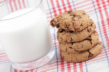 Milk with cookies on the table