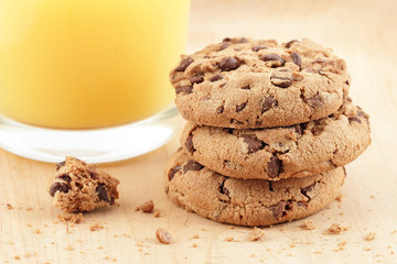 Fresh orange juice with cookie pile
