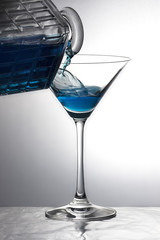 Pouring a blue drink