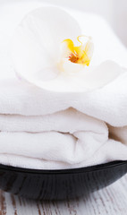 white orchids and towel