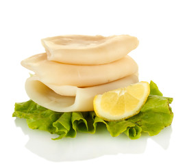 Naklejka na ściany i meble boiled squids with lettuce and lemon isolated on white