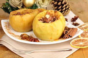 Baked apples on plate close up