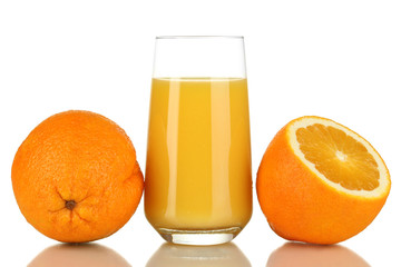 Delicious orange juice in glass and oranges next to it isolated