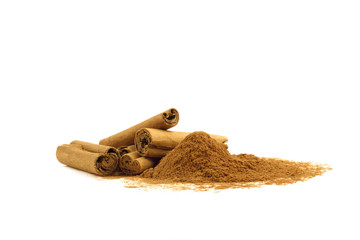 cinnamon sticks and powder on white background