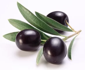 Foto auf Glas Ripe black olives with leaves. © volff