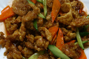Dry crispy beef in soy sauce and vegetables