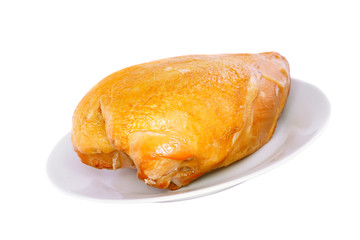A smoked chicken on plate . Isolated
