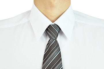 Man wearing white shirt and necktie