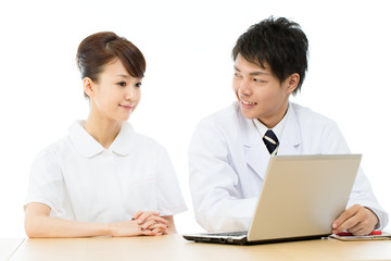 Asian young medical doctor isolated on white background