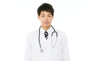 Asian young medical doctor isolated on white background