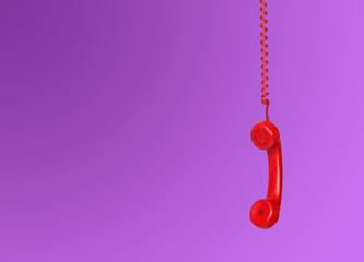 Red telephone cable hanging