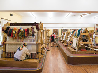 The woman behind work - weaving a carpet of silk
