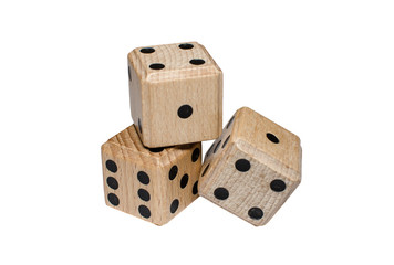 isolated pile of three wooden dice