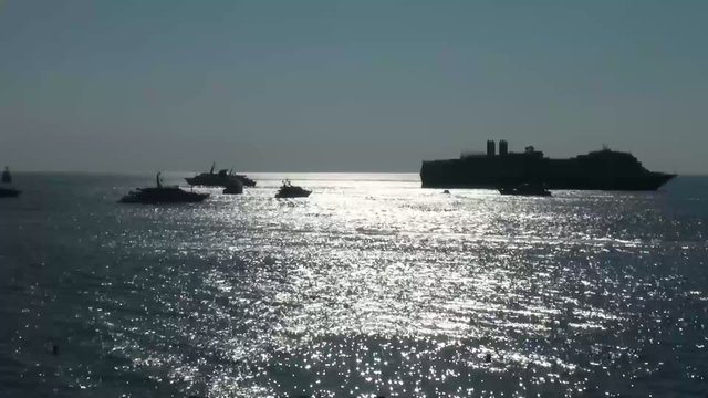 Circular view of sea filled with yachts and boats on a sunny day