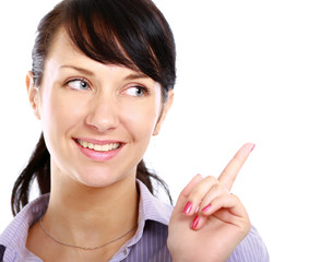 A young girl pointing at something