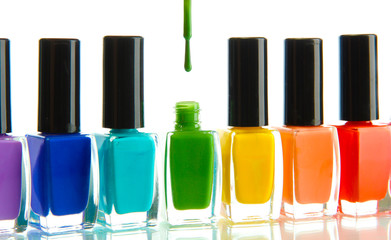 Group of bright nail polishes isolated on white