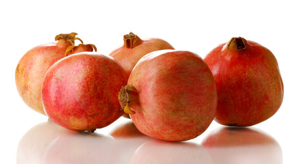 Ripe pomegranates isolated on white