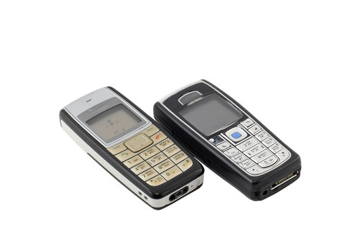 Antiques, old cellular(mobile) phones. Isolated