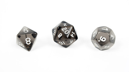 Three black dice isolated on white background