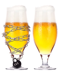 alcoholism concept - beer locked on a chain